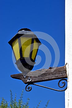 street lamp and a wall of house in calle los suspiros photo