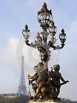 Street lantern on the Alexandre III Bridge against the Eiffel To