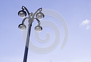 Street lantern on the sky background. city life, object.