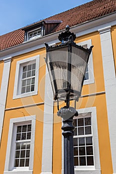 Street light in front of old building in Lingen