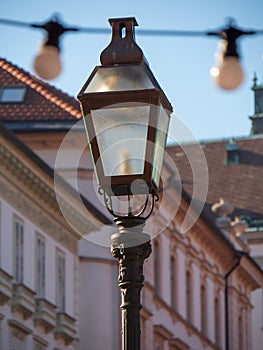 Street light lantern lamp. Old vintage antique retro urban exterior. Lamppost city illumination. Classic streetlight lighting.