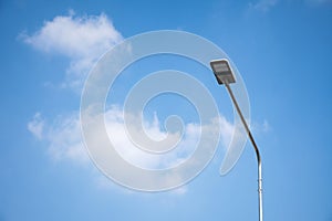 Street light LED on steel pole with blue sky and cloud