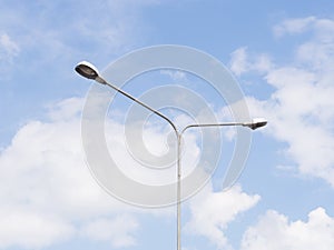 Street light over blue sky