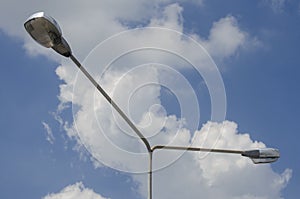 Street light pole on sky and cloud background