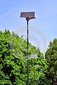 Street light powered by solar panel with battery included.