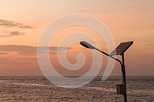 Street light with solar panel