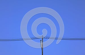 Street lighting against twilight blue sky