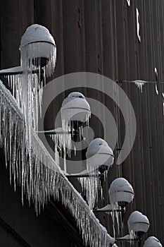 Street lights covered with ice at urban Halansky Finland