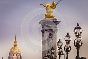 Street lights and Invalides in Pont Alexandre III, Paris, france