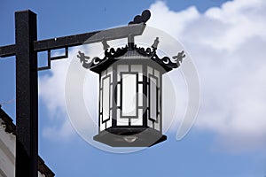 Street lamp with traditional Chinese characteristics.. photo