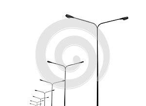 Street lightting poles isolated on white photo