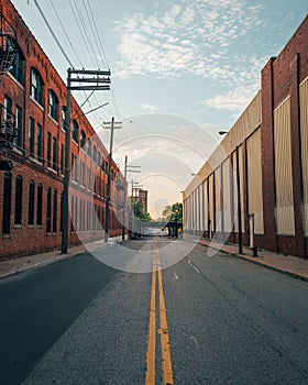 Street lined with old industrial buildings in Detroit, Michigan