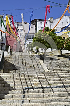 A street in Lisbon decorated with colored garlands
