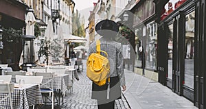 Street look of tourist woman in Ljubljana. Travel to Europe photo