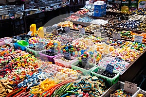 Street market stall selling jelly candy sweets at Suq Al Hamidiyah in Damascus