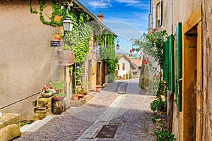 In the street of the medieval village Ternand in France