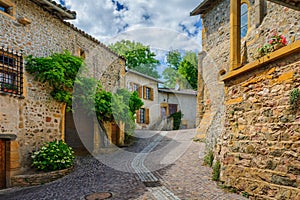 In the street of the medieval village Ternand in France