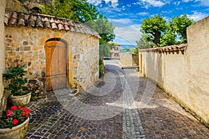 In the street of the medieval village Ternand in France