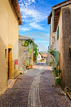 In the street of the medieval village Ternand in France