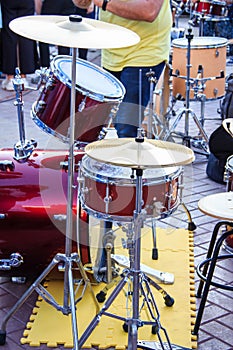 Street music band plays on various drum kits