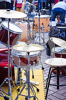 Street music band plays on various drum kits