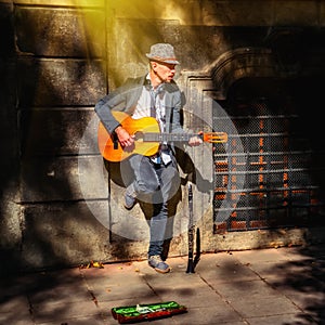 Street musician with guitar. Portrait. Music and  freedom concept