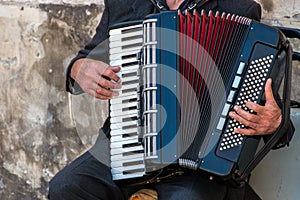 Street musician playing an accordion
