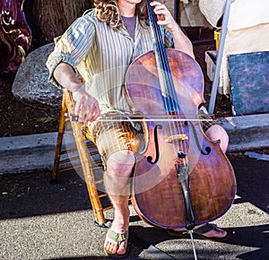 Street musician playing the cello