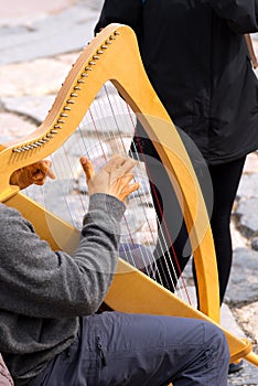 Street Musician Playing Classical Harp