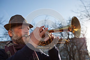 Street musician plays music