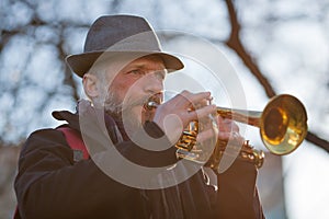 Street musician plays music