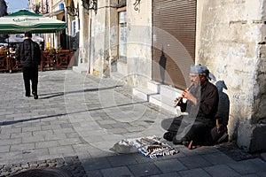 Street musician plays music outdoor