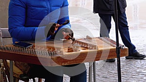 Street Musician Plays a Musical Instrument - Folk Cimbalom