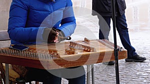 Street Musician Plays a Musical Instrument - Folk Cimbalom