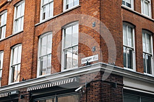 Street name sign on a building on Boundary Street in East London, UK
