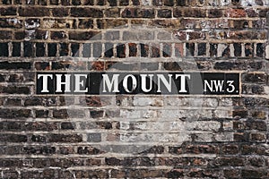 Street name sign on The Mount, Hampstead, London, UK.