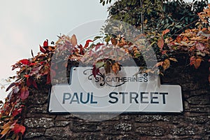 Street name sign on Paul Street in St Catherines Artisan Quarter in Frome, UK