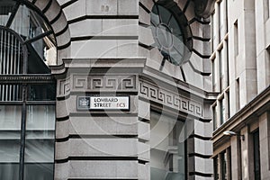 Street name sign on a side of a building on Lombard Street in the City of London, UK.