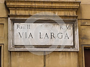 Street name sign of Via Larga in Rome, Italy