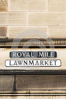 Street name signs at a house wall in Edinburgh