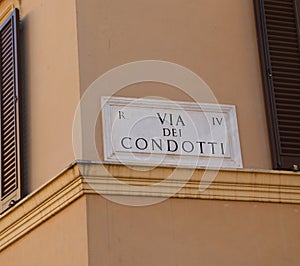 street name of Via dei Condotti in Rome Italy photo