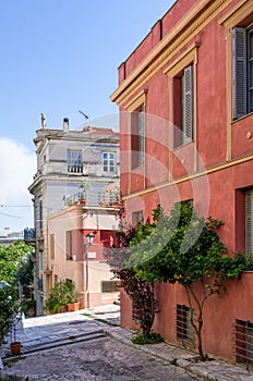 Street with neoclassical buildings in Mets neighborhood, Athens, Greece