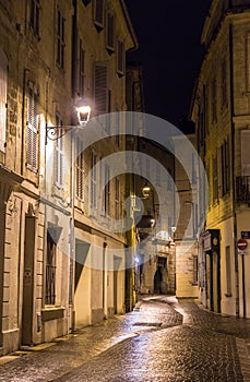 A street in night Avignon, France