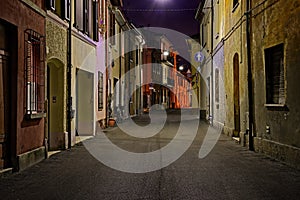 Street at night in the old town of an Italian city