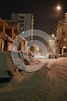 Street at night under snow