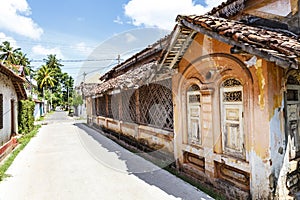 Street with old colonial biuldings in Negombo, Sri Lanka photo