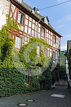 Street in old German town with traditional medieval timber framing houses