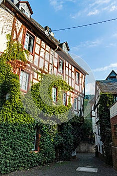 Street in old German town with traditional medieval timber framing houses