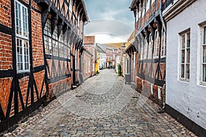 Street with old houses from royal town Ribe in Denmark