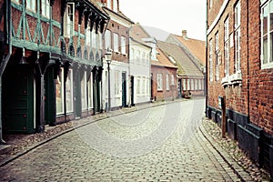 Street with old houses from royal town Ribe in Denmark